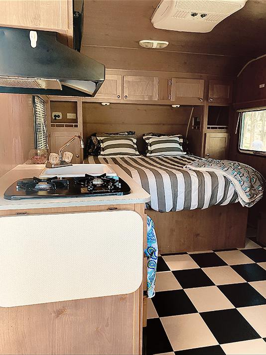 The Retro Trailer kitchen and bed